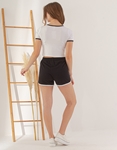 Εικόνα από  Σετ σόρτς & crop top Λευκό/Μαύρο