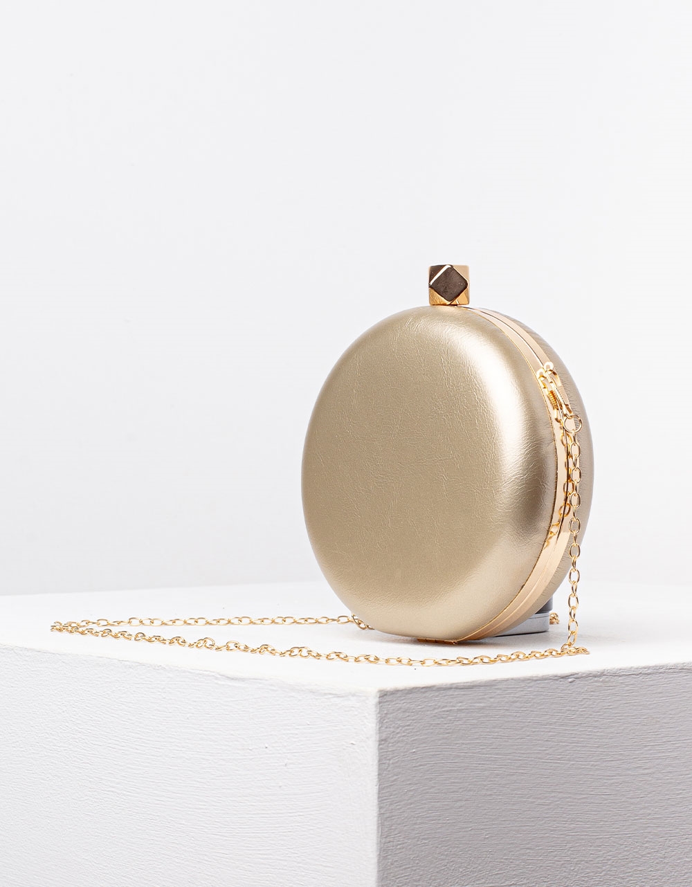 Εικόνα από Γυναικεία τσάντα clutch σε στρογγυλό σχήμα Χρυσό