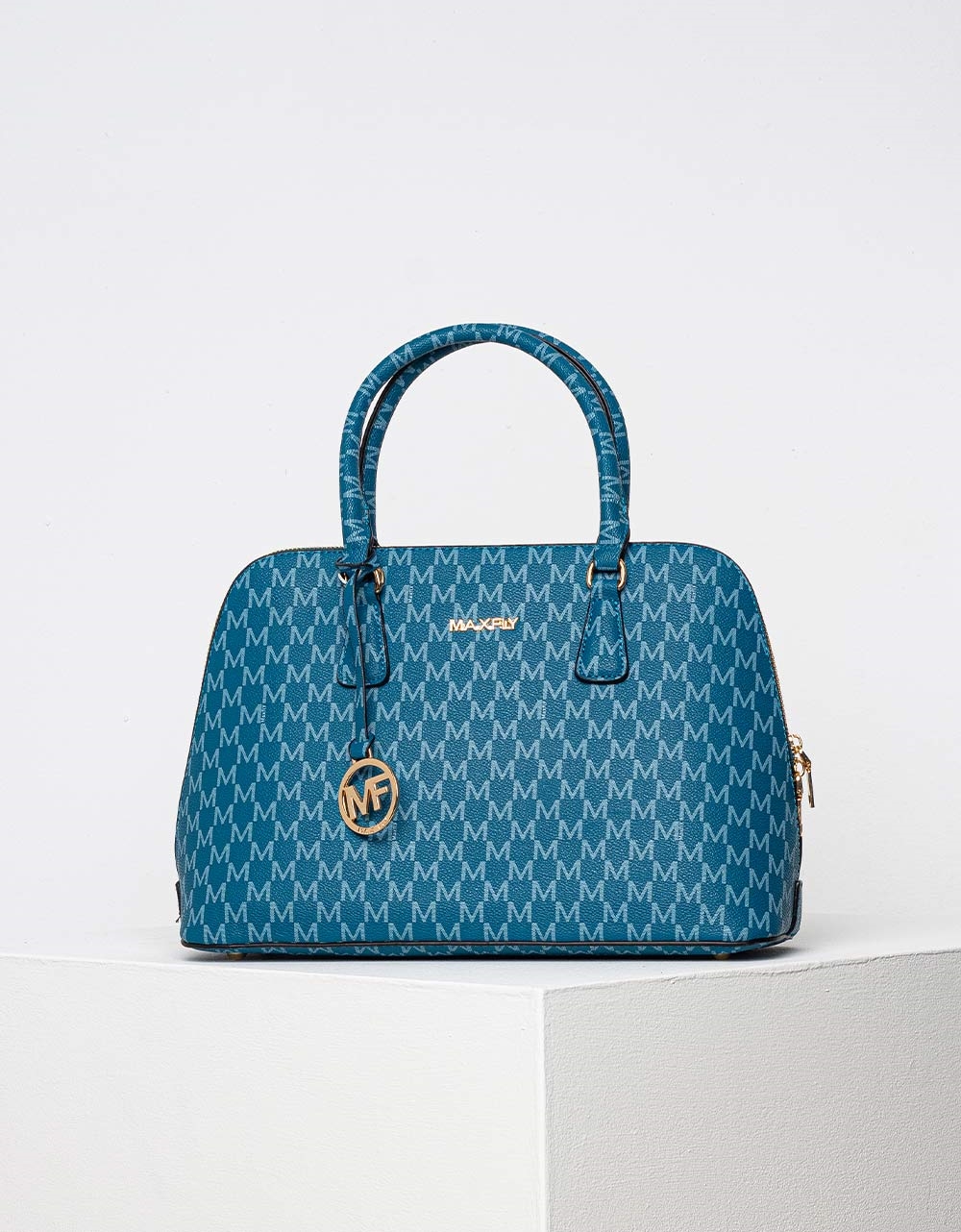 Εικόνα από Γυναικεία τσάντα χειρός με μεταλλικό διακοσμητικό Μπλε