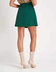 Εικόνα από Μονόχρωμη μίνι φούστα με λάστιχο στη μέση Πράσινο