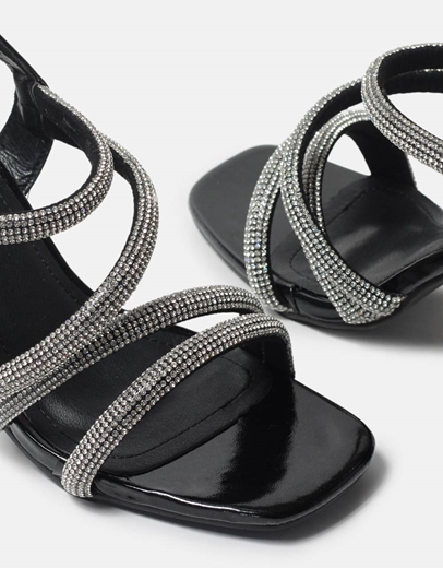 Εικόνα της Πέδιλα με χρυσή λεπτομέρεια στο τακούνι Μαύρο