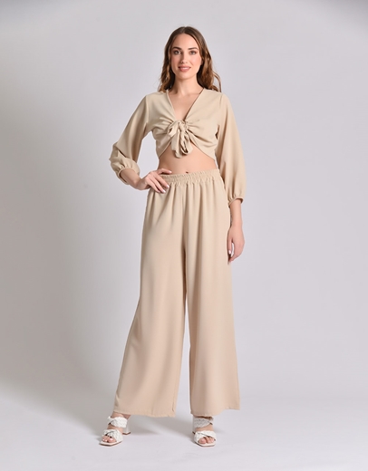 Εικόνα της Σετ μονόχρωμη παντελόνα και crop top με δέσιμο Μπεζ