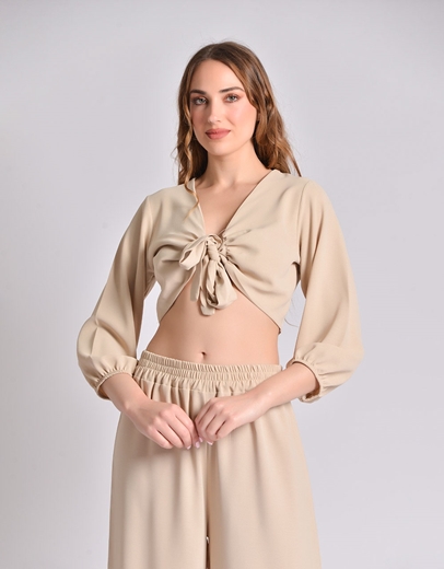 Εικόνα της Σετ μονόχρωμη παντελόνα και crop top με δέσιμο Μπεζ