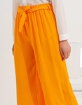Εικόνα από Wide leg παντελόνα με λάστιχο στη μέση και ζωνάκι Πορτοκαλί