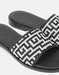 Εικόνα από Σανδάλια flat Ελληνικής κατασκευής με μοτίβο μαιάνδρου Μαύρο
